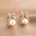Pearly Blinky Bow Gold - Earring